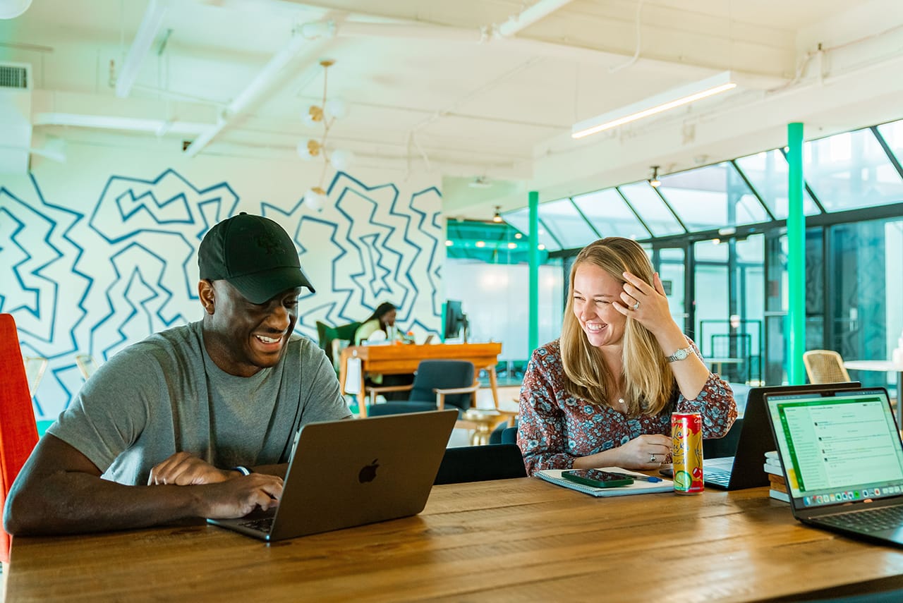 Corentt copy writing team discussing copy changes.